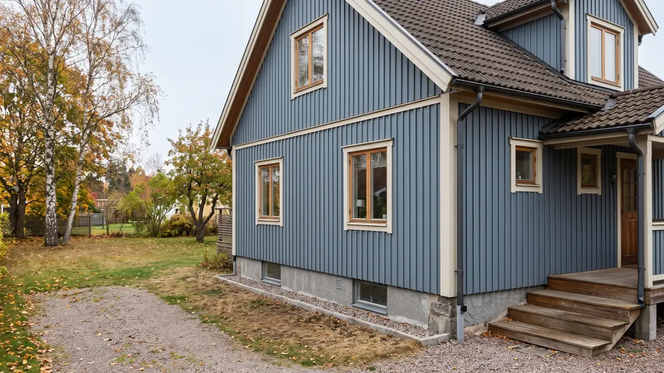 Illustration av en svensk villa med träfasad